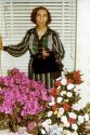 Sorour Aghdass Ghavami front of Photo