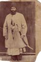 Haji Hossein Ali Khan Nassir Ol-Molk I Front of Photo